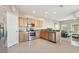 Modern kitchen with stainless steel appliances and granite countertops at 1115 Andrew Aviles Cir, Tampa, FL 33619