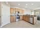 Modern kitchen with stainless steel appliances and granite countertops at 1115 Andrew Aviles Cir, Tampa, FL 33619