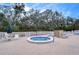 Community hot tub with surrounding seating at 11740 New Britain Dr, Spring Hill, FL 34609