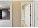 Hallway with bathroom and bedroom access at 12207 Arron Ter, Trinity, FL 34655