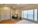 Bright bedroom with hardwood floors and built-in workspace at 1275 Drew St, Clearwater, FL 33755