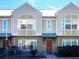 Front view of charming townhome with attractive facade and landscaping at 1275 Drew St, Clearwater, FL 33755
