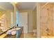 Bathroom with shower, toilet and single vanity at 1350 Gulf Blvd # 604, Clearwater, FL 33767