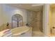 Relaxing bathroom featuring a large soaking tub and walk-in shower at 1350 Gulf Blvd # 604, Clearwater, FL 33767