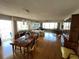 Bright living room with hardwood floors, dining area, and water views at 1365 Snell Isle Ne Blvd # 6A, St Petersburg, FL 33704