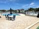 Resort-style pool with patio furniture, offering a relaxing waterfront view at 1365 Snell Isle Ne Blvd # 6A, St Petersburg, FL 33704