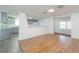 Spacious dining area with light wood flooring and kitchen views at 2009 Windsor Way, Tampa, FL 33619