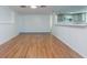 Large dining area with wood floor and kitchen access at 2009 Windsor Way, Tampa, FL 33619