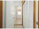 Hallway with tile flooring and built-in storage at 2009 Windsor Way, Tampa, FL 33619