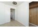 View of a room with tiled floor and wooden closet at 2009 Windsor Way, Tampa, FL 33619
