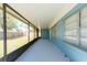 Screened-in porch overlooking backyard at 2009 Windsor Way, Tampa, FL 33619