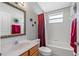 Bathroom with a tub, shower, and wood vanity at 24745 Portofino Dr, Lutz, FL 33559