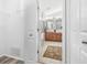 Bathroom with double vanity, shower, and access to closets at 24745 Portofino Dr, Lutz, FL 33559