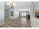 Spacious dining room with hardwood floors and recessed lighting at 24745 Portofino Dr, Lutz, FL 33559