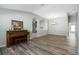 Dining room features hardwood floors and an attractive chandelier at 24745 Portofino Dr, Lutz, FL 33559
