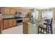 Modern kitchen with stainless steel appliances and granite countertops at 24745 Portofino Dr, Lutz, FL 33559