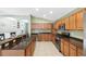 Spacious kitchen with stainless steel appliances and ample cabinetry at 24745 Portofino Dr, Lutz, FL 33559