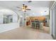 Kitchen boasts wood cabinets, tile flooring and an island with seating at 24745 Portofino Dr, Lutz, FL 33559