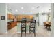Kitchen features wood cabinets, granite counters, and stainless steel appliances at 24745 Portofino Dr, Lutz, FL 33559