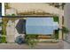 Aerial view shows a renovated house with metal roof and a small yard at 2515 N Howard Ave, Tampa, FL 33607