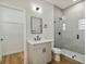 Modern bathroom with a walk-in shower and updated vanity at 2515 N Howard Ave, Tampa, FL 33607