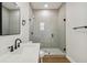 Updated bathroom with a walk-in shower and modern vanity at 2515 N Howard Ave, Tampa, FL 33607