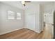 Bedroom with hardwood floors and double door closet at 2515 N Howard Ave, Tampa, FL 33607