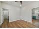 Bright bedroom with hardwood floors and access to closet at 2515 N Howard Ave, Tampa, FL 33607
