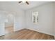 Bright bedroom with wood floors and access to another bedroom at 2515 N Howard Ave, Tampa, FL 33607