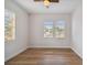 Bright bedroom with wood floors and multiple windows at 2515 N Howard Ave, Tampa, FL 33607