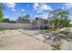 House exterior showcasing light gray siding and a small yard at 2515 N Howard Ave, Tampa, FL 33607