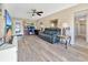 Living room with hardwood floors and a home office area at 2533 Duncan Dr, Belleair Bluffs, FL 33770