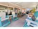 Relaxing screened porch with patio furniture and ample seating at 2533 Duncan Dr, Belleair Bluffs, FL 33770