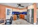 Modern kitchen with stainless steel appliances, ample counter space, and blue backsplash at 2619 Miriam S St, Gulfport, FL 33711