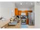 Modern kitchen with granite countertops and stainless steel appliances at 2765 Via Cipriani # 1232B, Clearwater, FL 33764