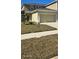 Two-story townhome with attached garage and well-manicured lawn at 2933 Jacob Crossing Ln, Holiday, FL 34691