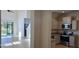 Modern kitchen with stainless steel appliances and light-colored cabinetry at 2933 Jacob Crossing Ln, Holiday, FL 34691