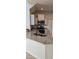 Kitchen features granite countertops and modern appliances at 2933 Jacob Crossing Ln, Holiday, FL 34691