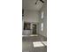 Spacious living room with high ceilings and tile floors at 2933 Jacob Crossing Ln, Holiday, FL 34691