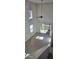 High ceiling living room with tile floors and access to backyard at 2933 Jacob Crossing Ln, Holiday, FL 34691