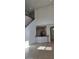 Two-story living room with high ceilings and tile floors at 2933 Jacob Crossing Ln, Holiday, FL 34691