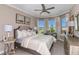 Spacious bedroom with bay window and tray ceiling at 29658 Cassino Ct, Wesley Chapel, FL 33543