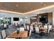 Community dining area with numerous tables and chairs at 29658 Cassino Ct, Wesley Chapel, FL 33543