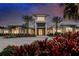 Stunning clubhouse entrance with landscaping and stone accents at 29658 Cassino Ct, Wesley Chapel, FL 33543