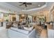 Open concept great room with kitchen, dining, and living areas at 29658 Cassino Ct, Wesley Chapel, FL 33543