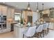Gourmet kitchen featuring granite countertops and stainless steel appliances at 29658 Cassino Ct, Wesley Chapel, FL 33543