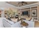 Spacious living room with ample natural light and stylish furnishings at 29658 Cassino Ct, Wesley Chapel, FL 33543
