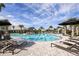 Large resort-style pool with plenty of lounge chairs at 29658 Cassino Ct, Wesley Chapel, FL 33543