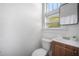 Simple bathroom with a vanity and toilet at 3105 W Spruce St, Tampa, FL 33607