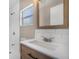 Updated bathroom features a new vanity and white tile at 3105 W Spruce St, Tampa, FL 33607